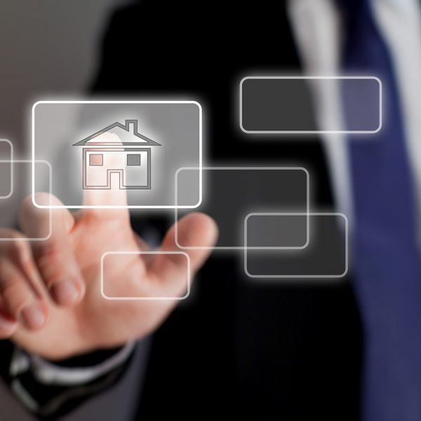 Real estate investor using technology to buy houses